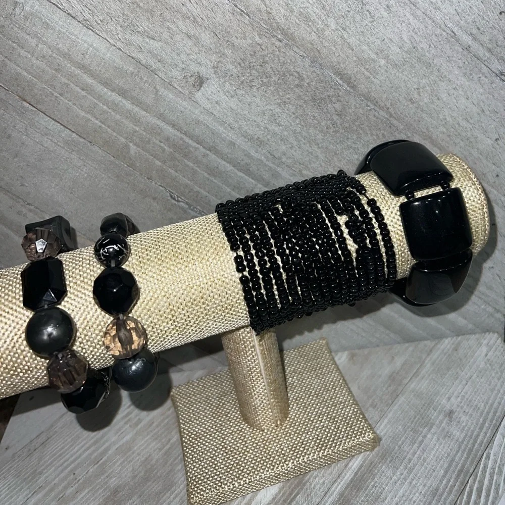 4 black bracelets